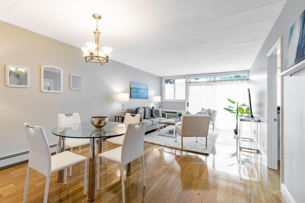 345 Harvard Street, Unit 3C Cambridge, MA 02138 - Photo 2 of 21 a view of a livingroom and dining room