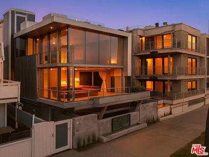 a living room with couch and a large window