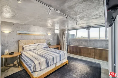 a view of a balcony with a couple of people