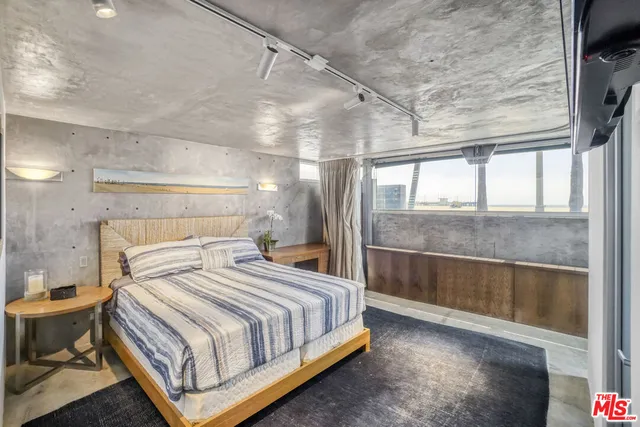 a view of a balcony with a couple of people