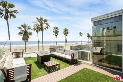 a view of balcony with furniture