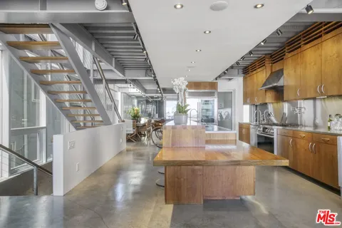 a living room with a couch and a table
