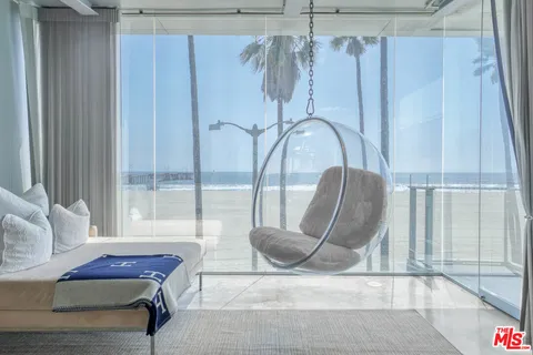 a view of a glass door and porch