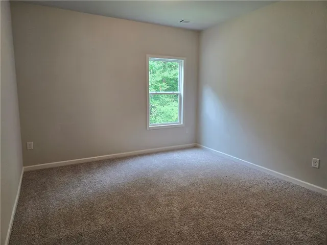 a view of a window in an empty room