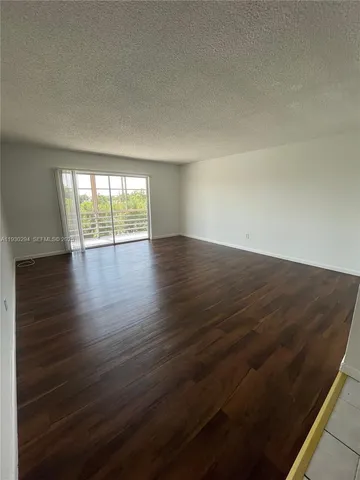 a bathroom with a sink a toilet a mirror and vanity