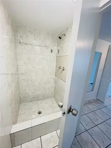 a view of empty room with windows