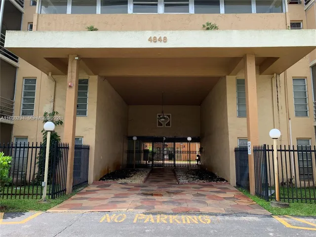 a cars parked in front of a house