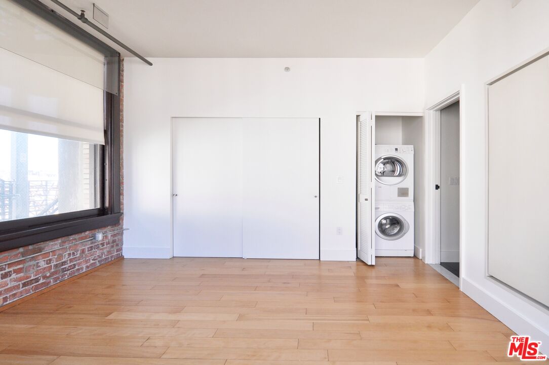 460 South Spring Street, Unit 701 Los Angeles, CA 90013 - Photo 15 of 31 a view of a storage & utility room with a window