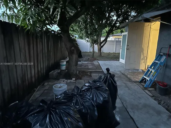 a backyard of a house with lots of green space