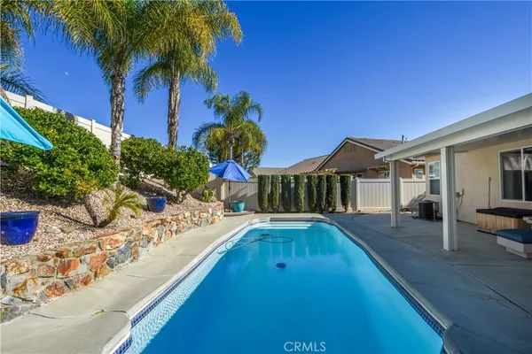 a view of a house with swimming pool