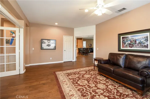 a living room with furniture and a rug