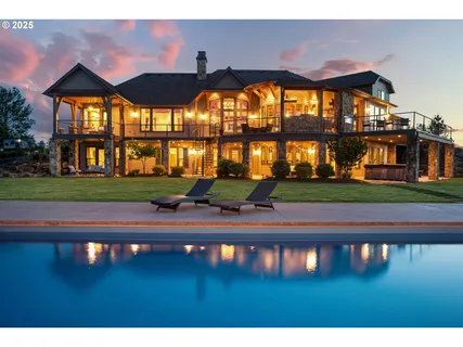 a front view of house with yard and outdoor seating
