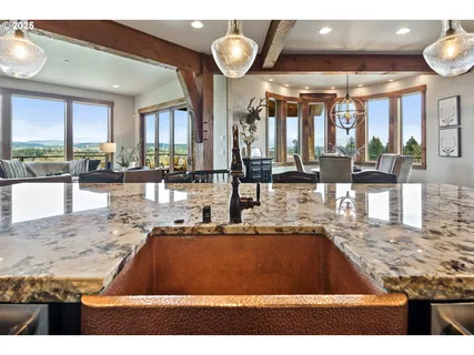 a view of a living room and kitchen