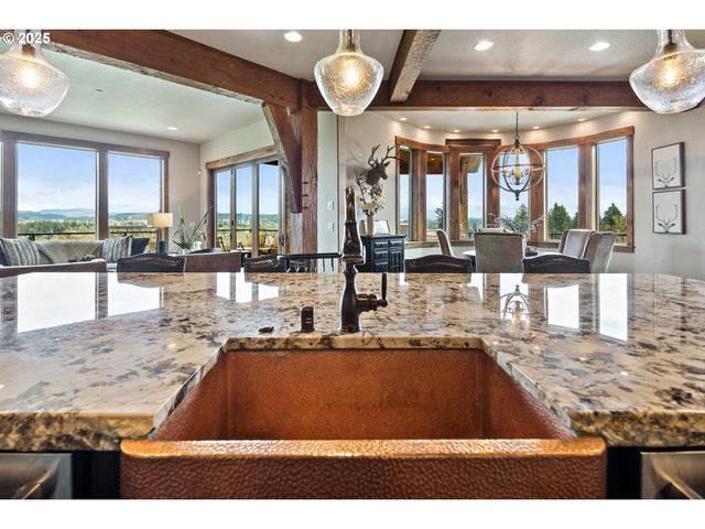 a view of a living room and kitchen