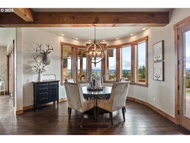 a dining room with furniture window wooden floor