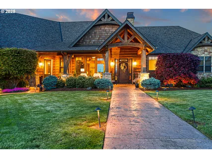 a front view of house with an outdoor seating