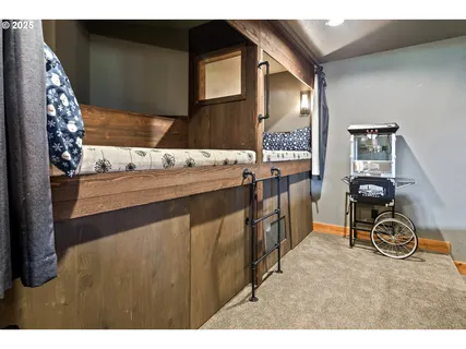 a upper view of a kitchen with a sink and cabinets