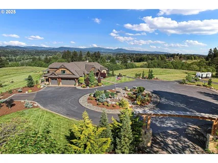 a view of a chairs and table in a yard