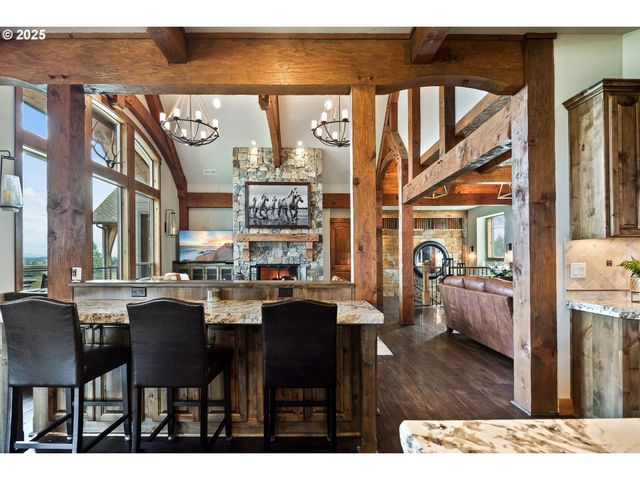 a dinning area with furniture and window