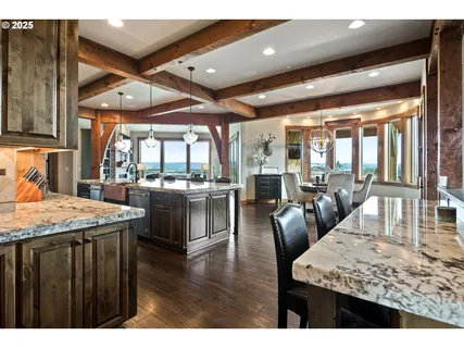 a open kitchen with a table and chairs