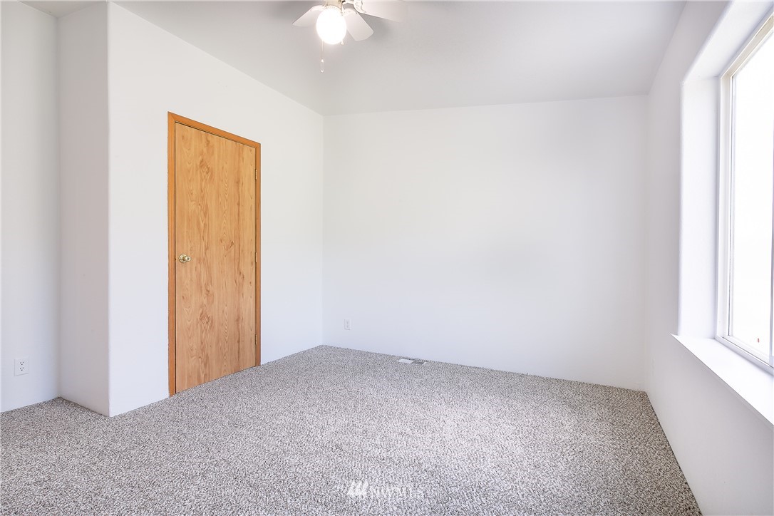 9690 Delta Line Road Blaine, WA 98230 - Photo 22 of 38 an empty room with windows