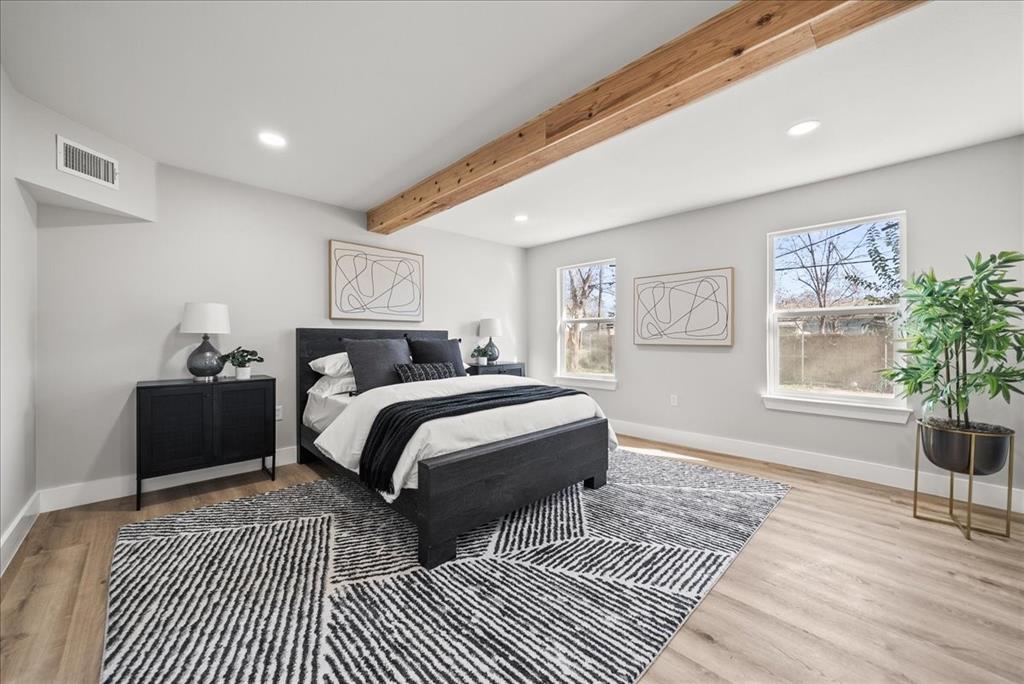 11630 Rupley Lane Dallas, TX 75218 - Photo 12 of 30 a bedroom with double bed and a window