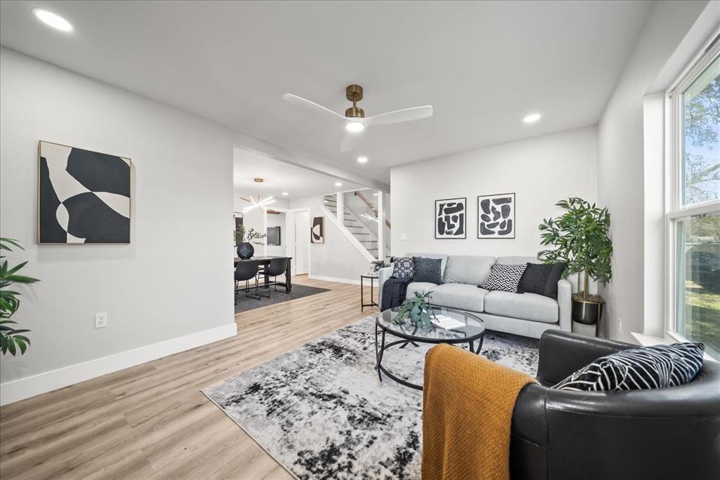 11630 Rupley Lane Dallas, TX 75218 - Photo 4 of 30 a living room with furniture and a large window