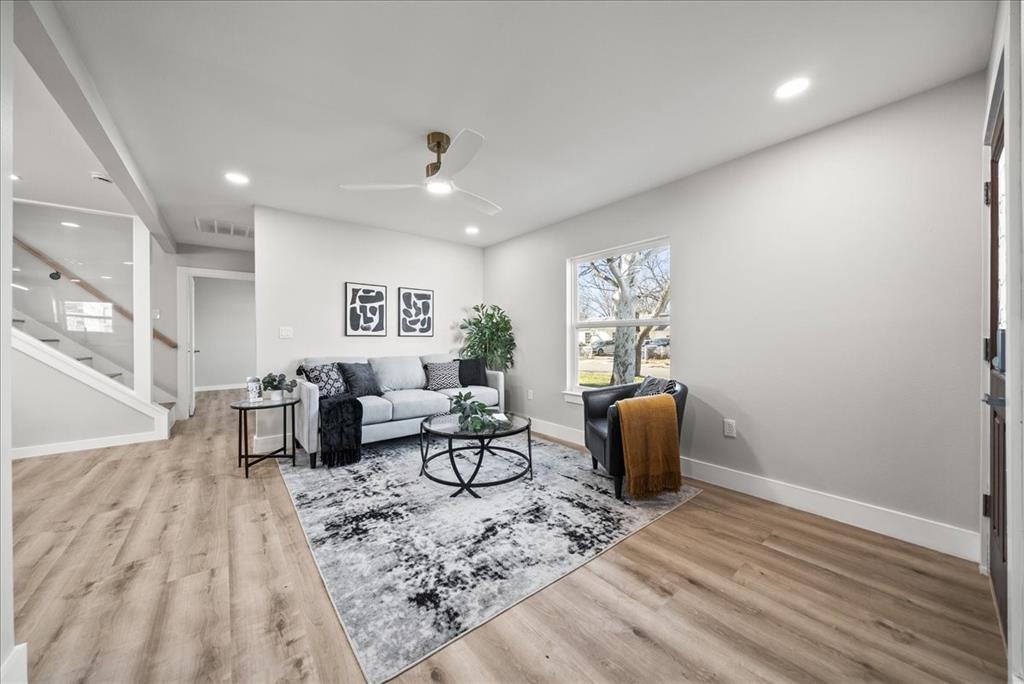 11630 Rupley Lane Dallas, TX 75218 - Photo 5 of 30 a living room with furniture and wooden floor
