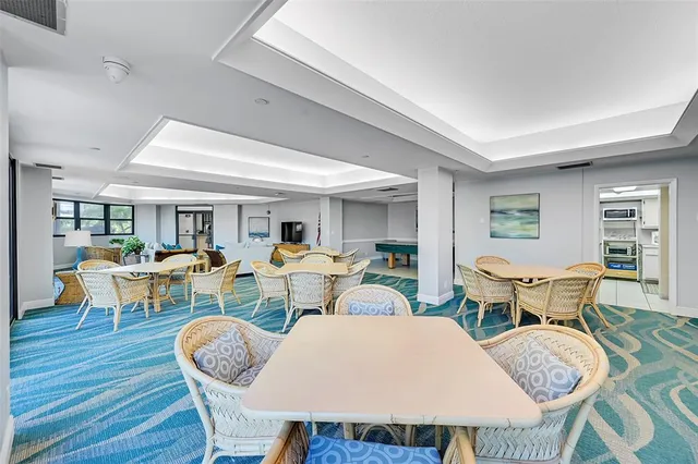 front view of building with a garden