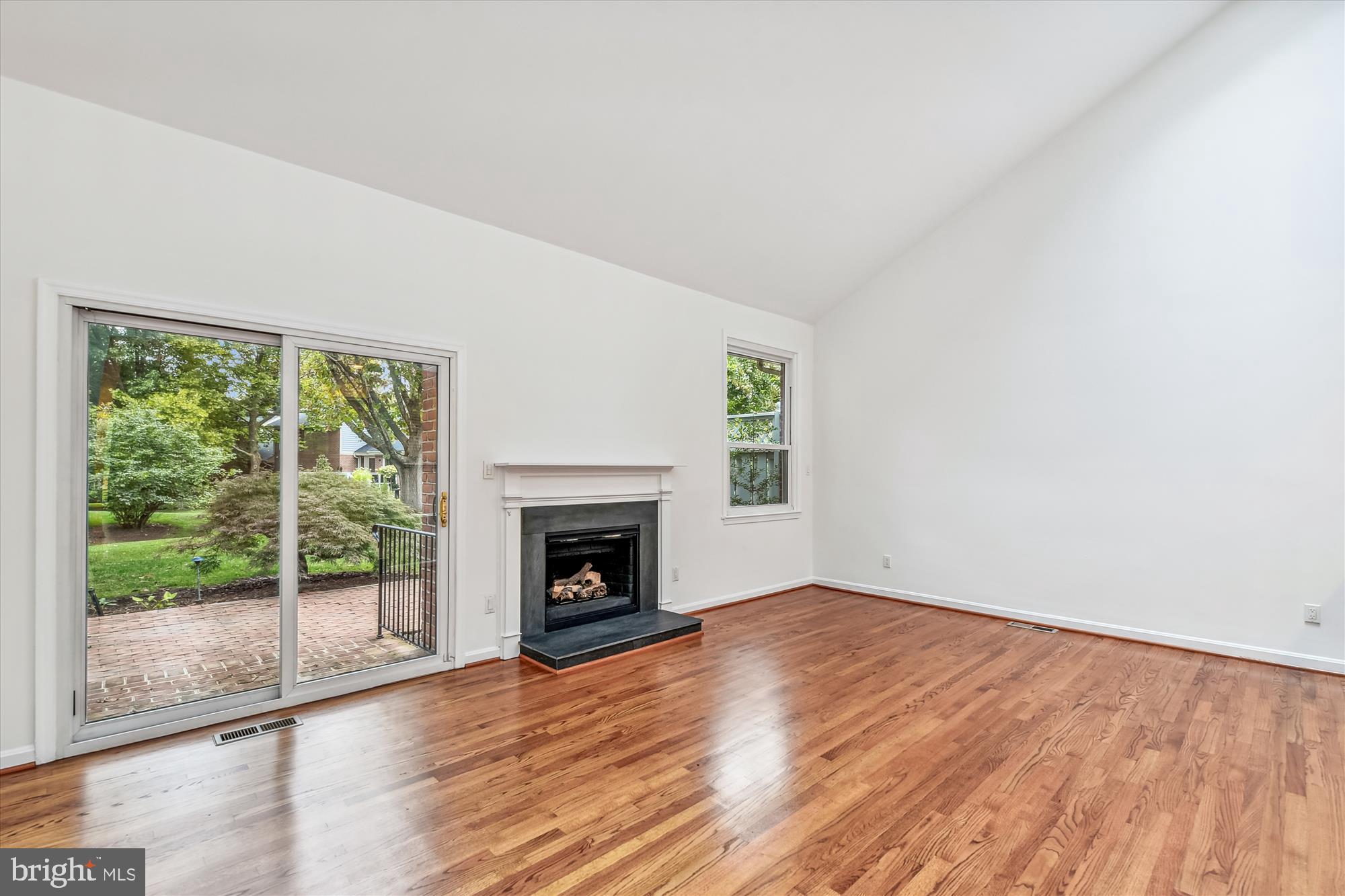4 Spring House Road Lutherville-Timonium, MD 21093 - Photo 5 of 34 Living room flows onto beautiful brick patio