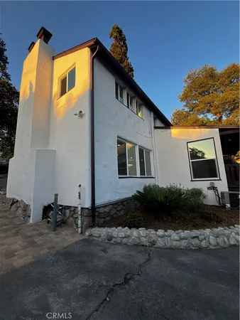 a large kitchen with a stove top oven