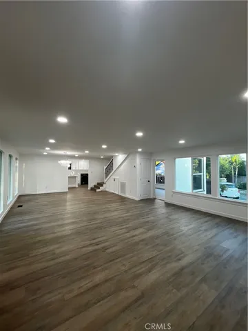 a view of a room with a fireplace