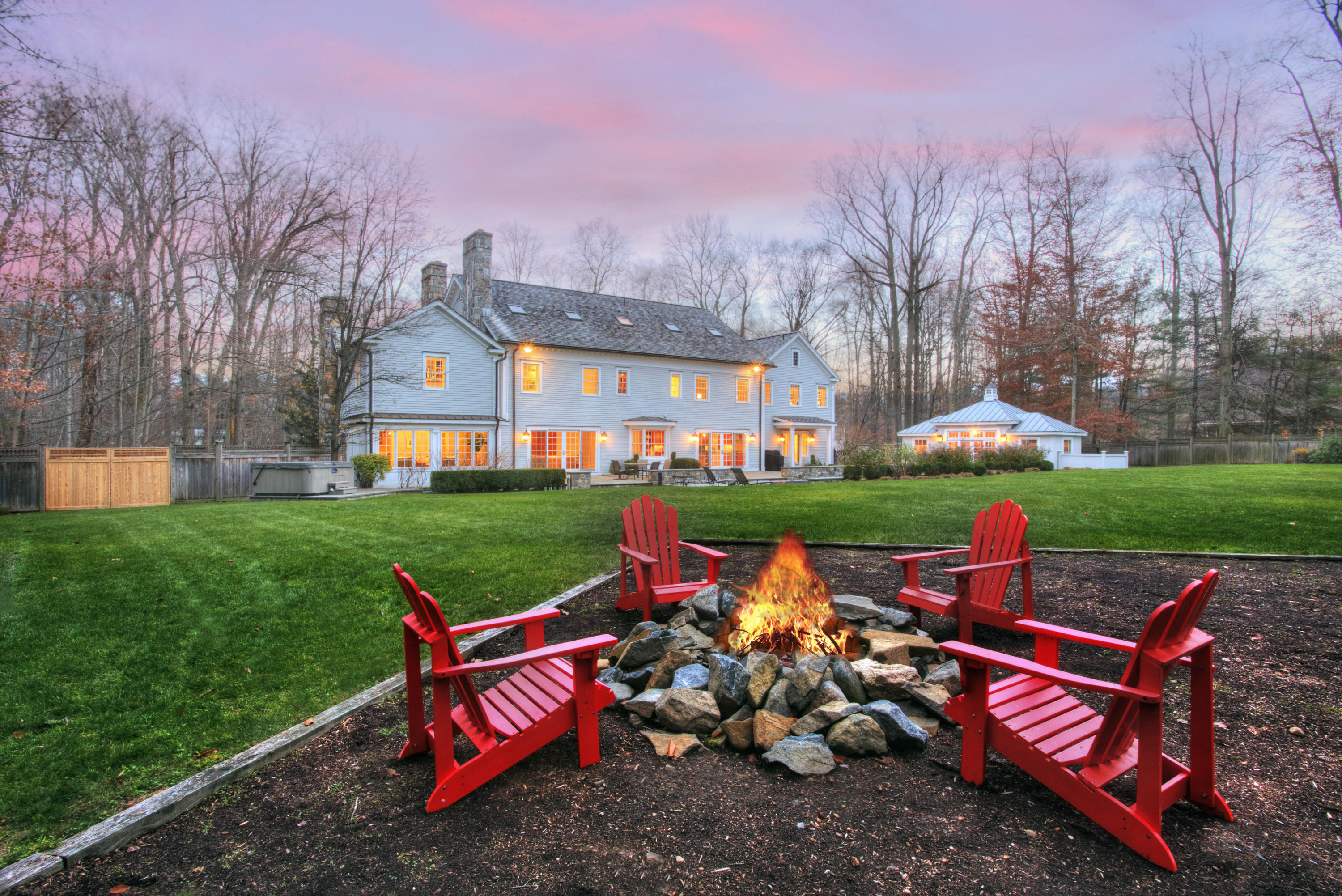 40 Blueberry Lane Darien, CT 06820 - Photo 1 of 1 a view of a house with backyard sitting area and garden
