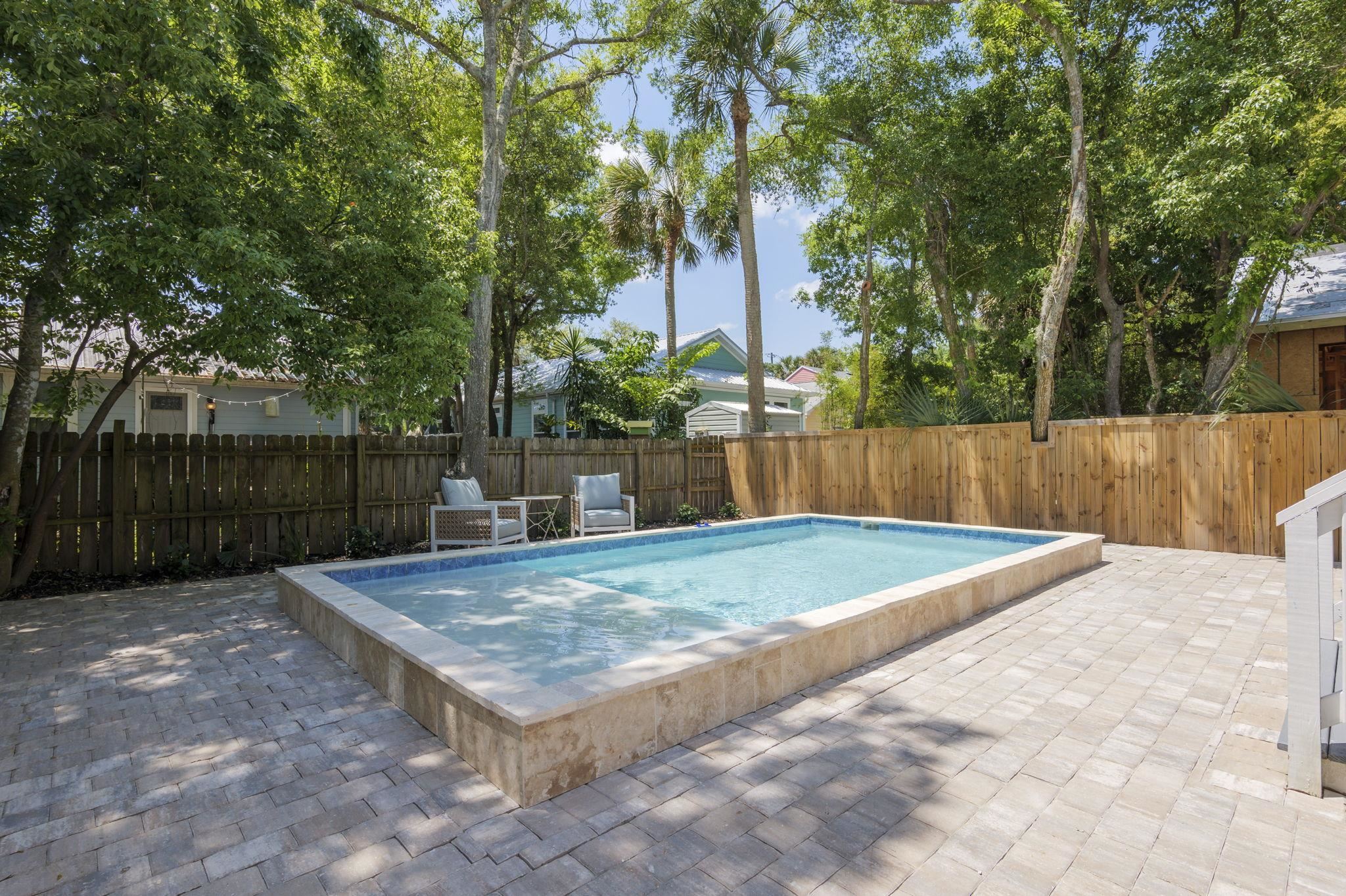 160 Blanco Street St. Augustine, FL 32084 - Photo 12 of 43 a view of a backyard with wooden fence