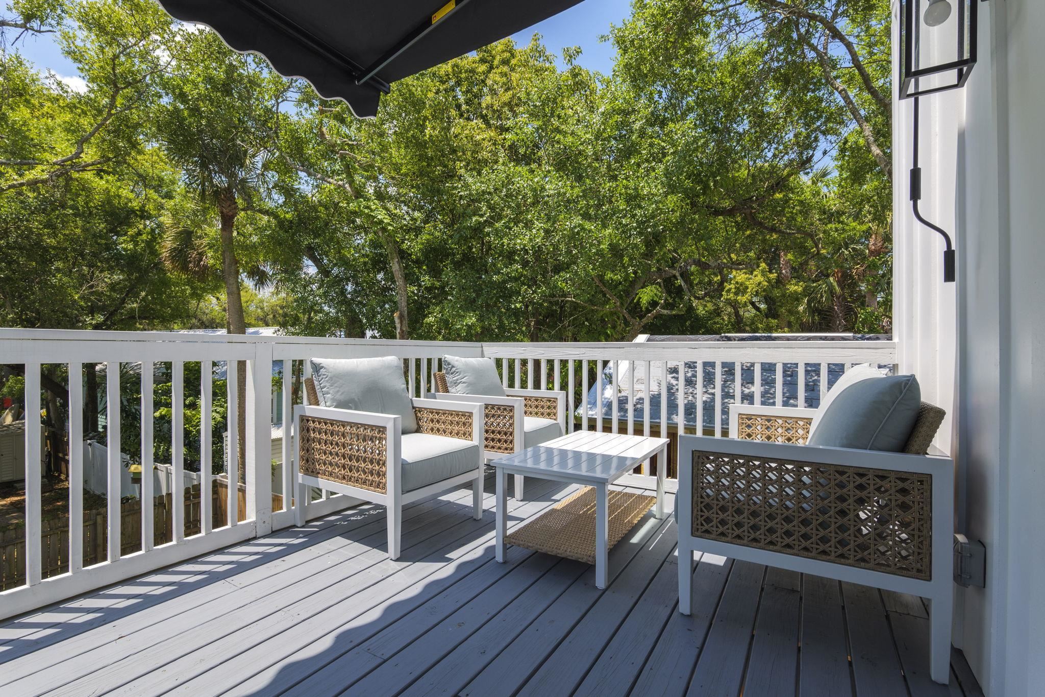 160 Blanco Street St. Augustine, FL 32084 - Photo 20 of 43 a view of balcony with wooden floor and outdoor seating