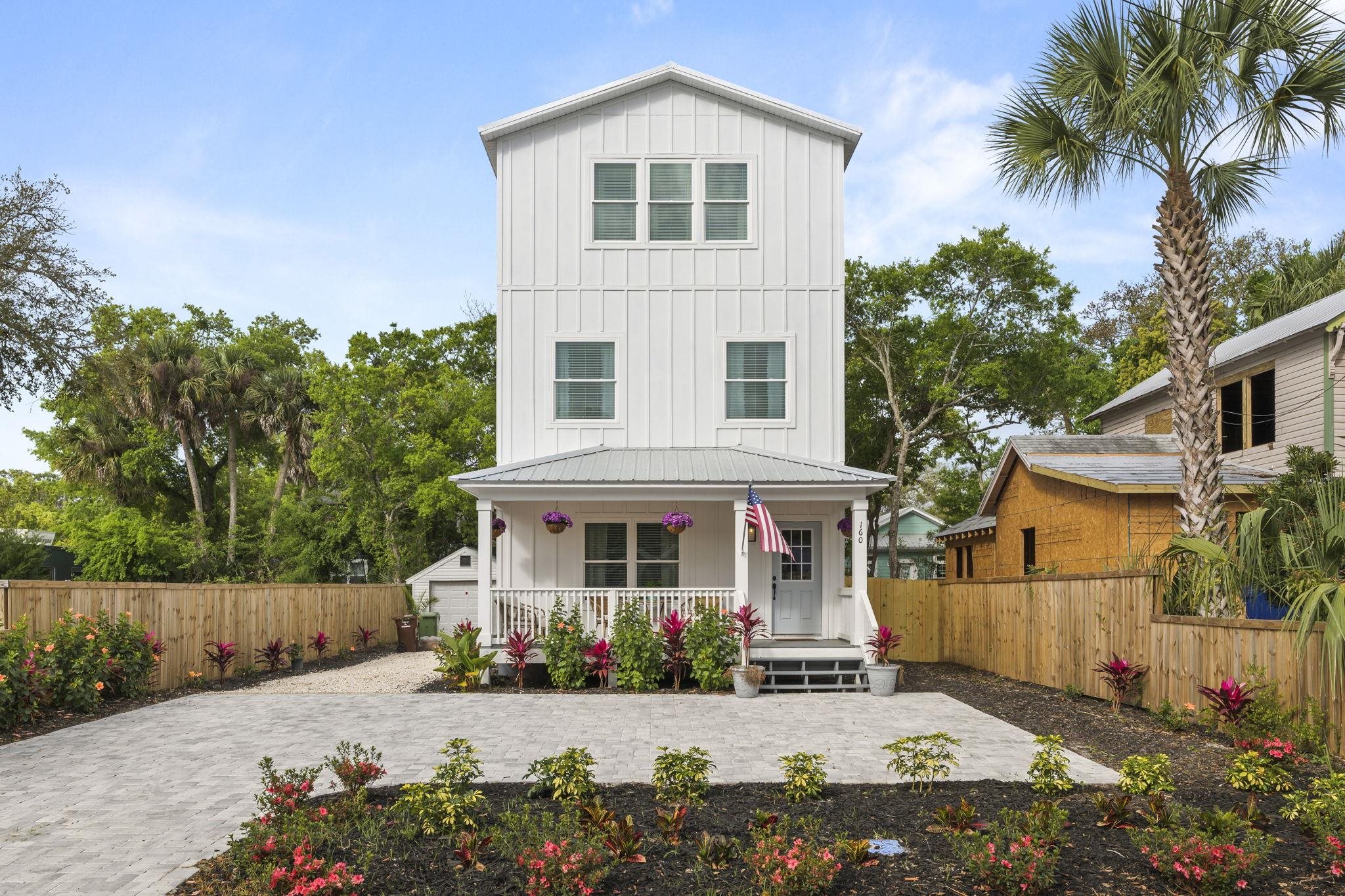160 Blanco Street St. Augustine, FL 32084 - Photo 2 of 43 front view of a house with a yard