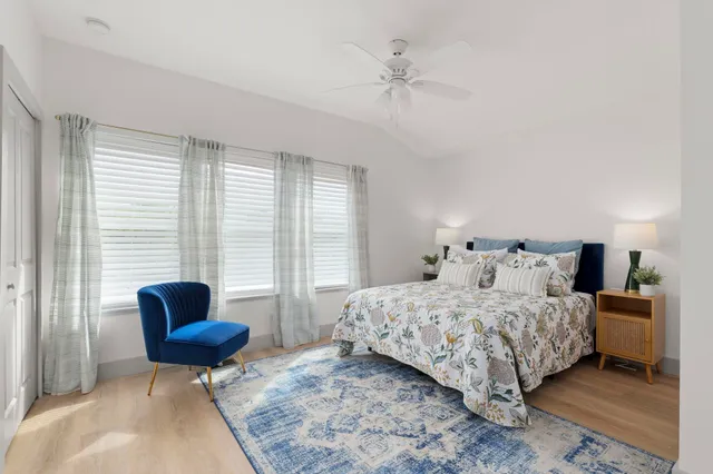 a bathroom with a tub and a toilet