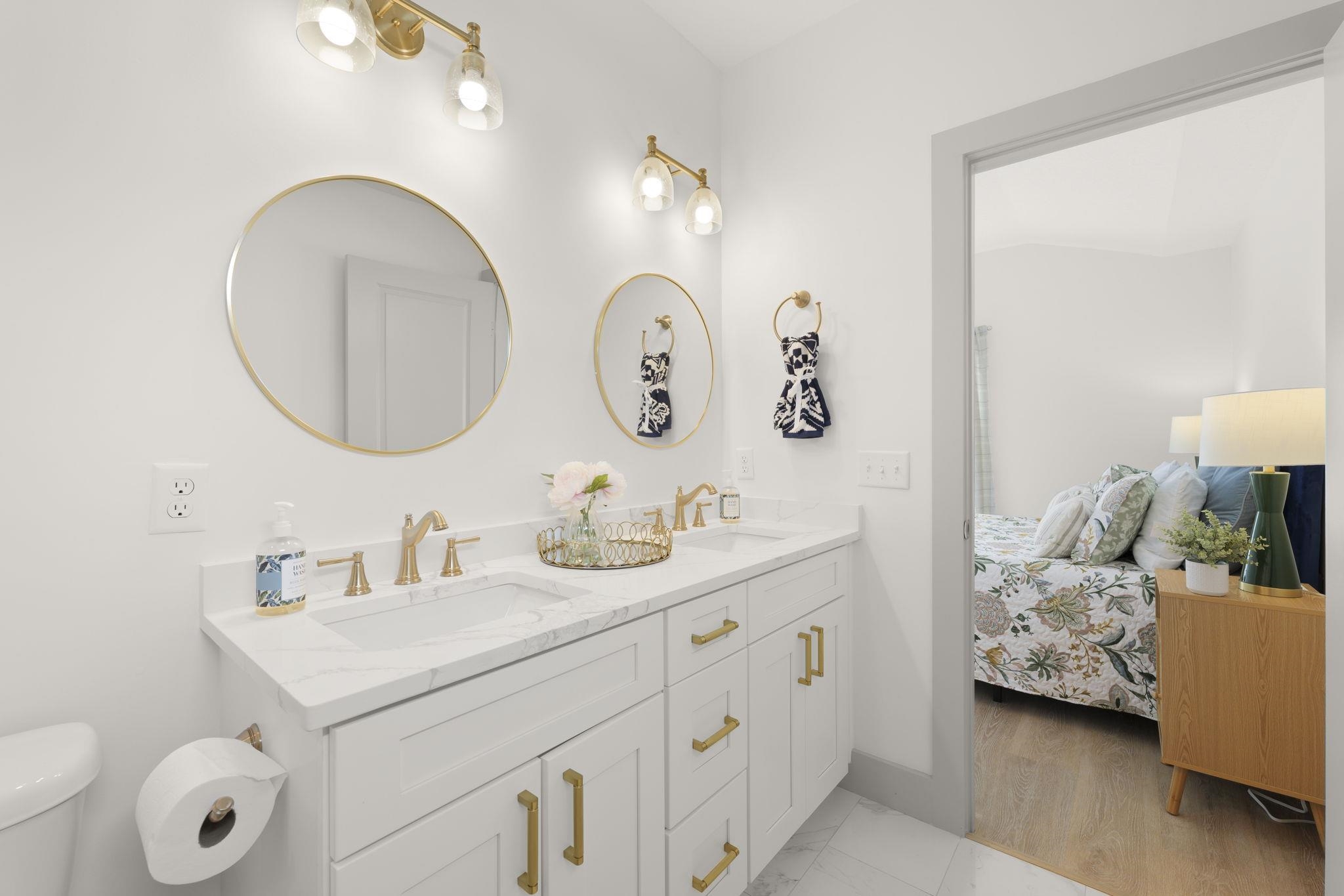 160 Blanco Street St. Augustine, FL 32084 - Photo 33 of 43 a bathroom with a sink and a mirror