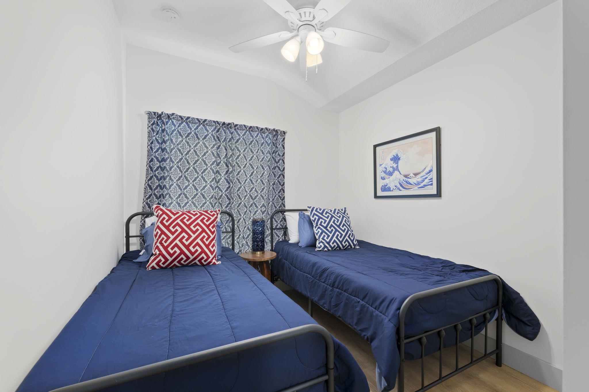 160 Blanco Street St. Augustine, FL 32084 - Photo 35 of 43 a bedroom with a bed and dresser