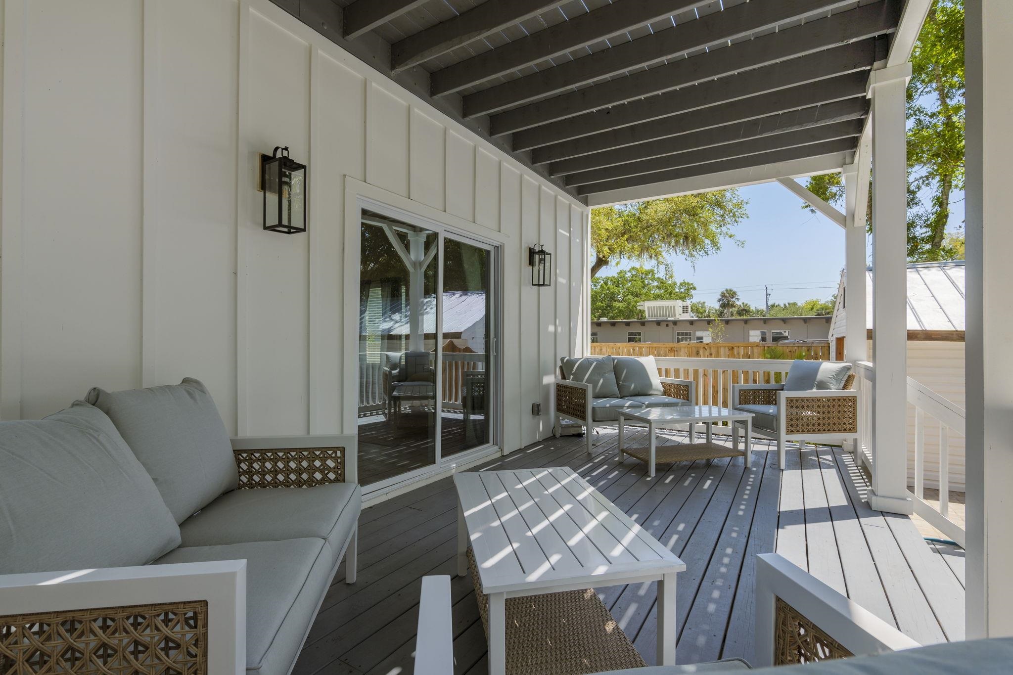 160 Blanco Street St. Augustine, FL 32084 - Photo 10 of 43 a balcony with furniture and outdoor view