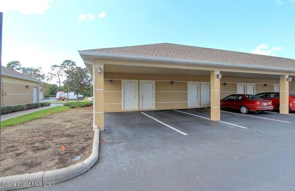 3848 Lexmark Lane, Unit 302 Rockledge, FL 32955 - Photo 16 of 18 a view of a car garage