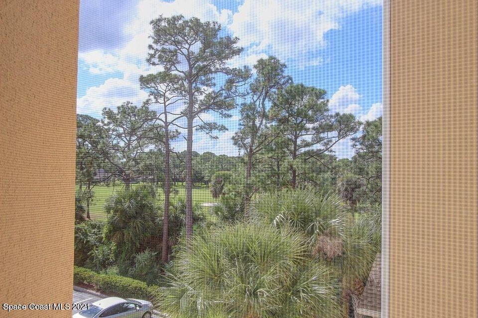 3848 Lexmark Lane, Unit 302 Rockledge, FL 32955 - Photo 3 of 18 a bathroom with a small yard