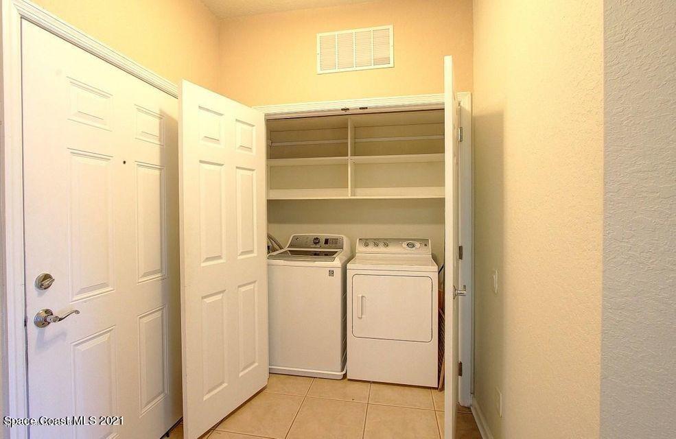 3848 Lexmark Lane, Unit 302 Rockledge, FL 32955 - Photo 10 of 18 a utility room with dryer and washer