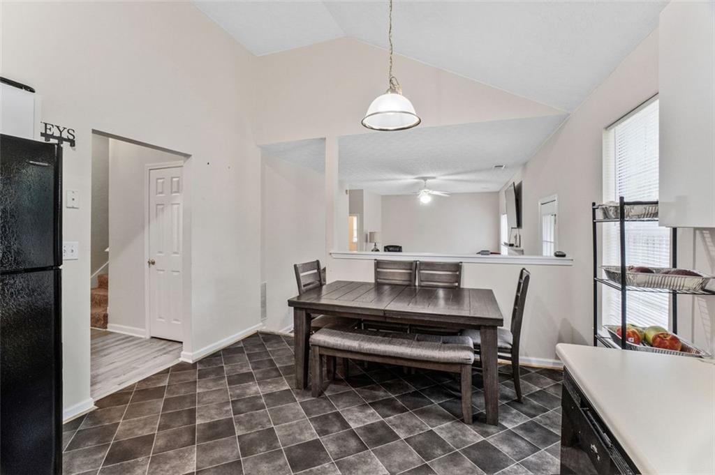 675 Michael Circle Monroe, GA 30655 - Photo 15 of 34 a room with furniture a rug and kitchen view