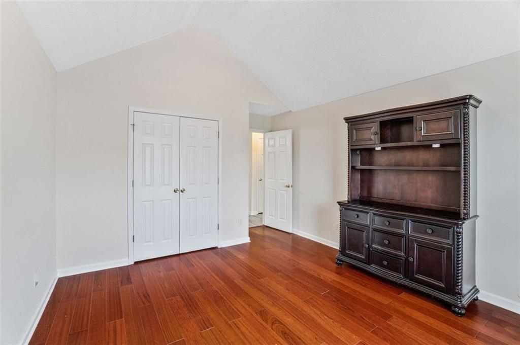 675 Michael Circle Monroe, GA 30655 - Photo 27 of 34 a view of empty room with wooden floor and cabinet