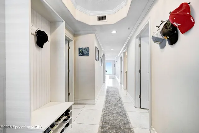 a kitchen with granite countertop a refrigerator and a sink