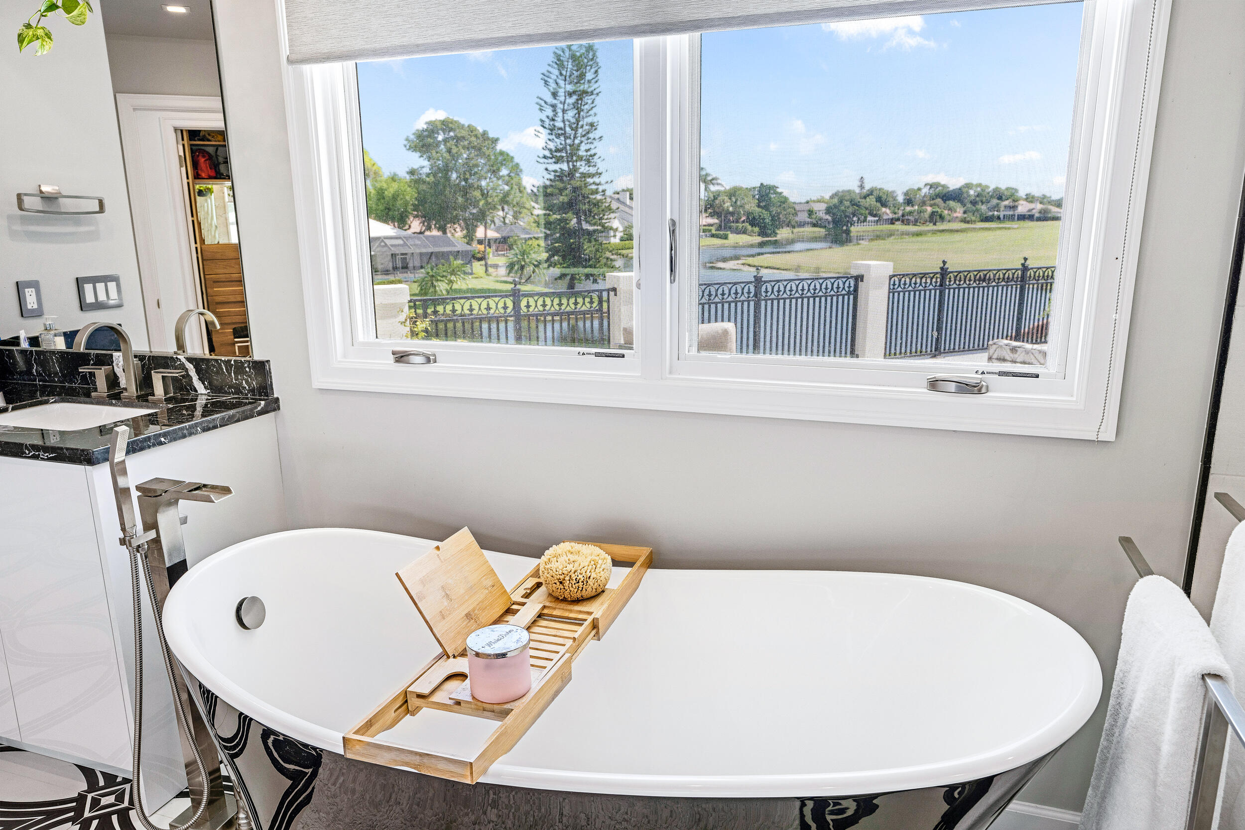3 Sheldrake Circle Palm Beach Gardens, FL 33418 - Photo 11 of 48 a view of a dining room with furniture window and outside view