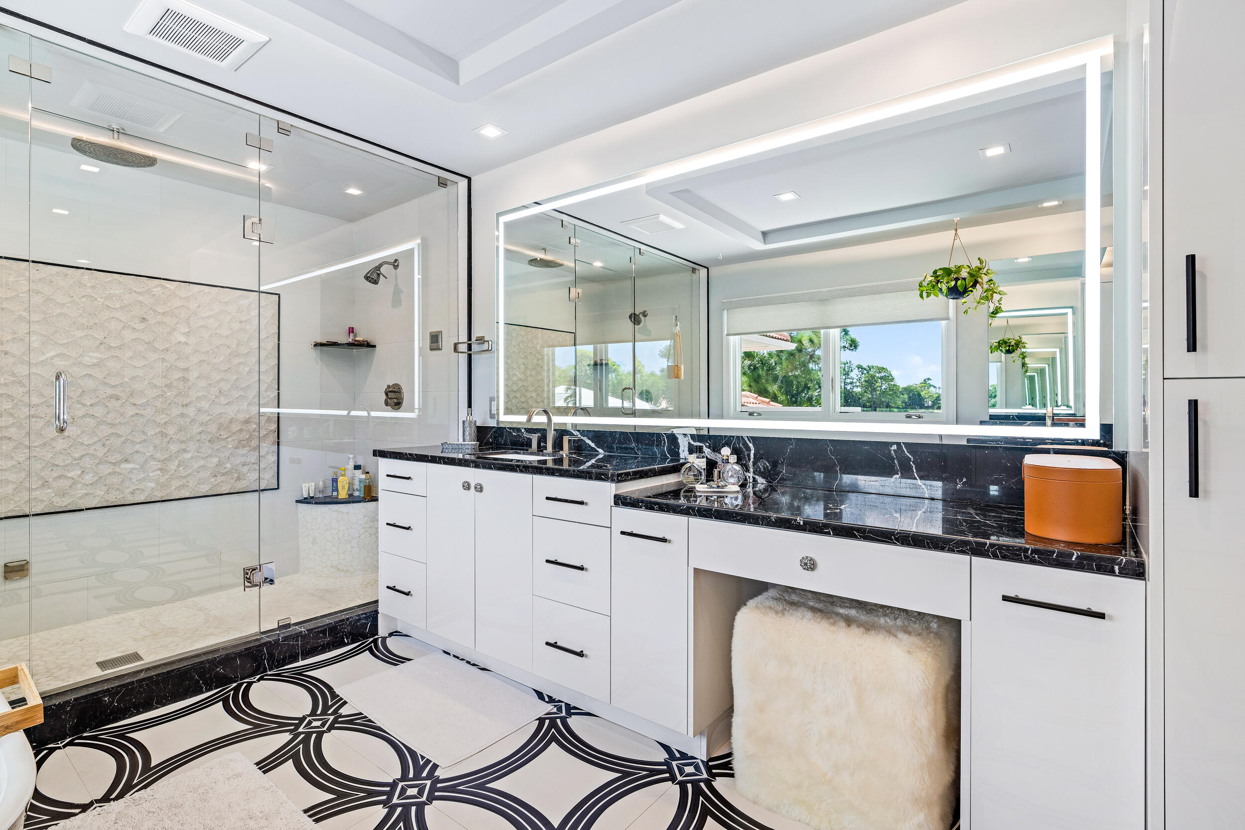 3 Sheldrake Circle Palm Beach Gardens, FL 33418 - Photo 12 of 48 a kitchen with stainless steel appliances a sink and a refrigerator