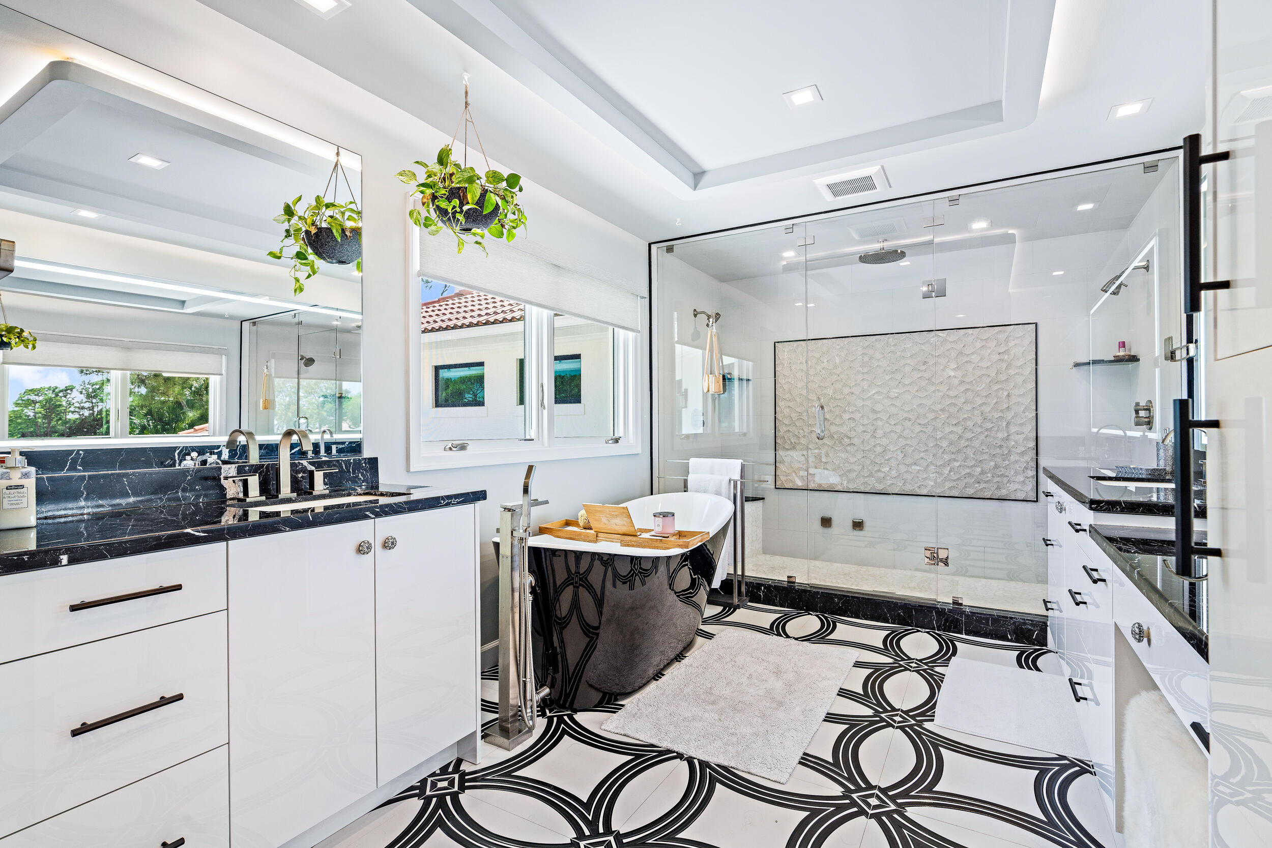 3 Sheldrake Circle Palm Beach Gardens, FL 33418 - Photo 13 of 48 a kitchen with a table chairs stove and cabinets