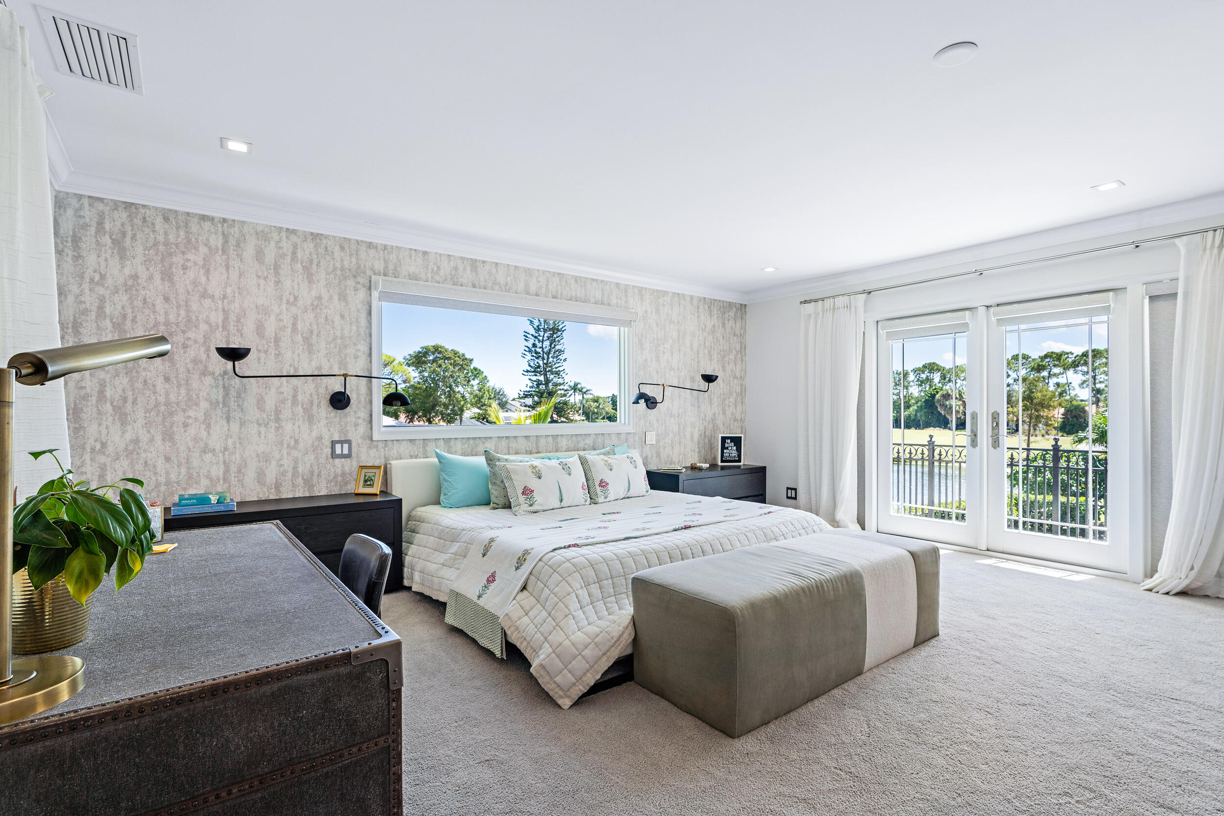 3 Sheldrake Circle Palm Beach Gardens, FL 33418 - Photo 14 of 48 a bedroom with a bed and a couch